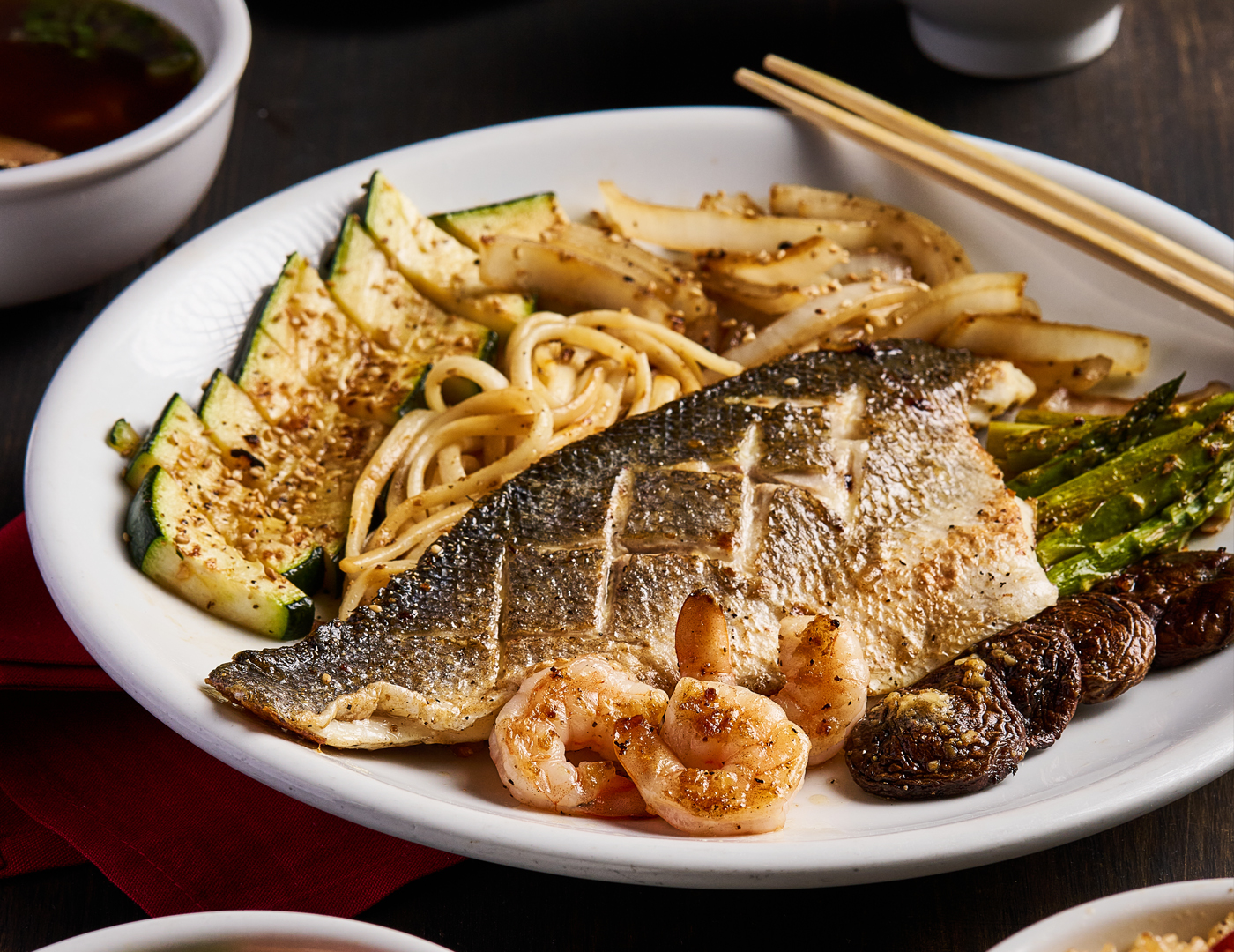 Our featured Summer Entrée showcases a delicate Branzino Filet served as part of a complete five-course hibachi meal.